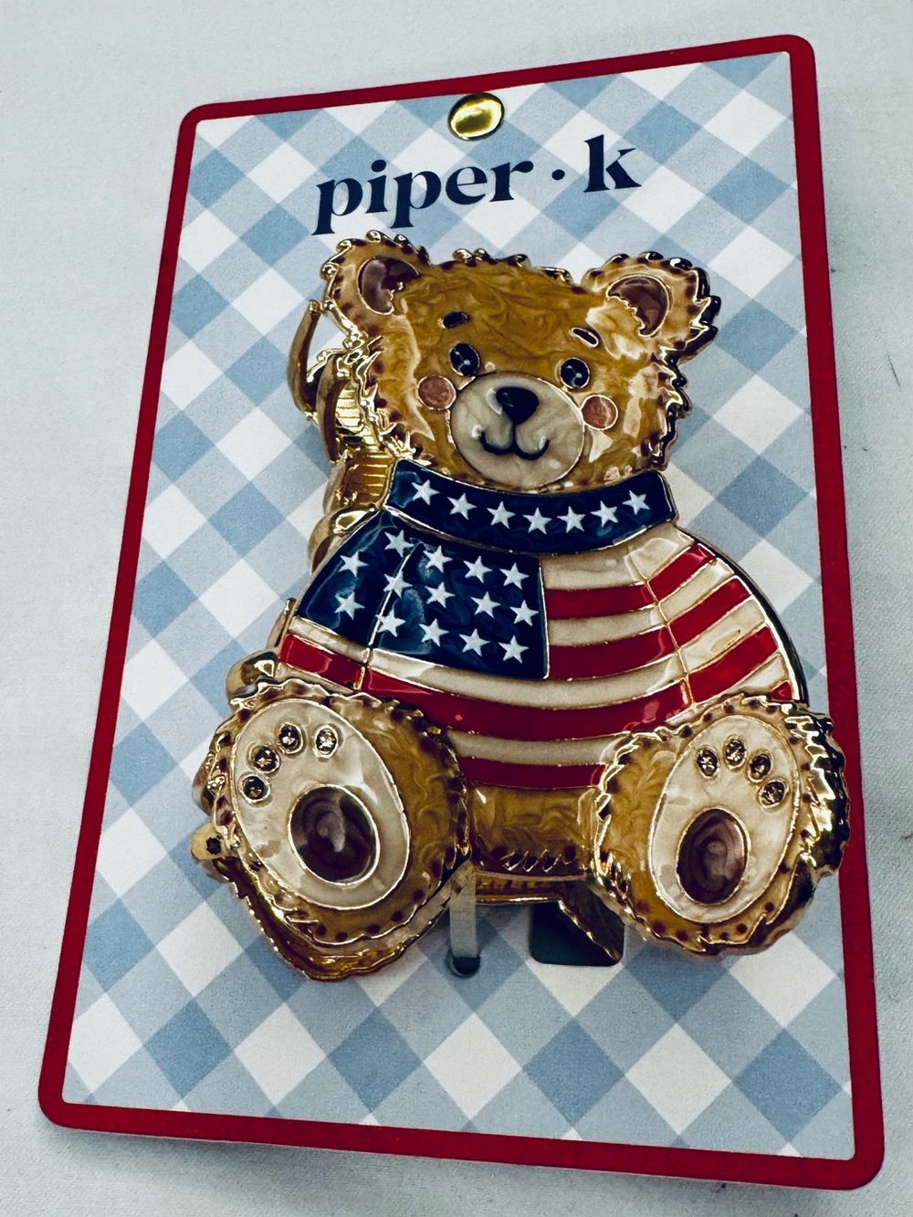 Piper Gold Teddy Bear Hair Clip with Red and Blue Flag Scarf